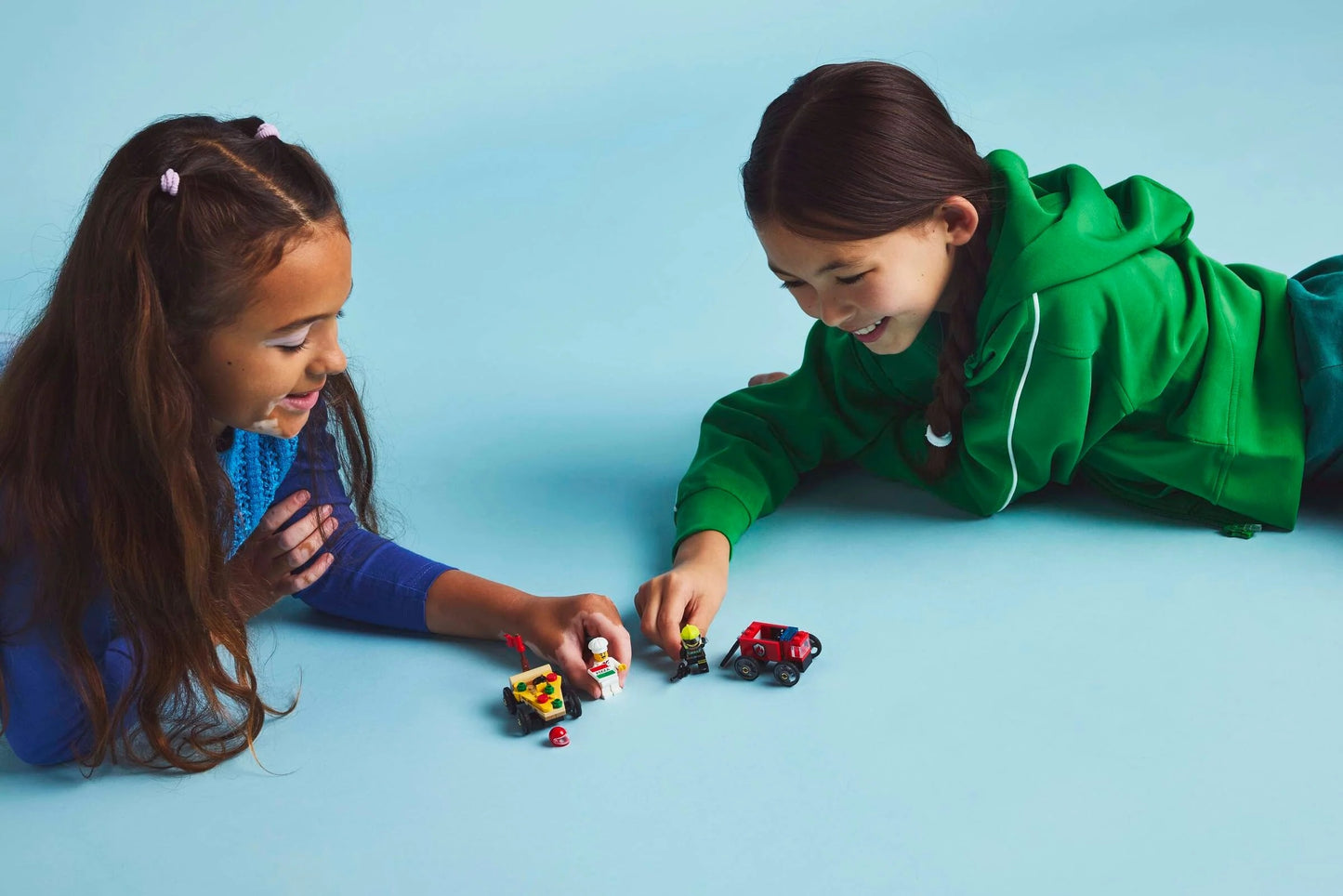 Pack de bolides de course : camion de pizza contre camion de pompiers - LEGO® City