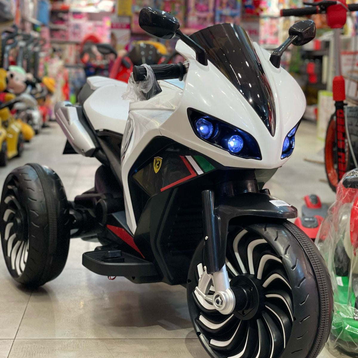 Moto électrique 12V à 3 roues pour enfants avec télécommande parentale et roues LED